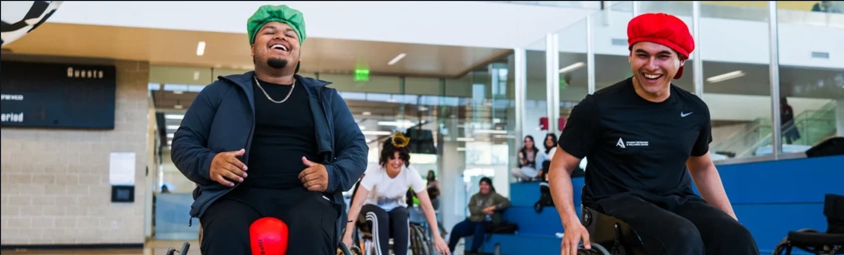 Students in wheelchairs playing a game