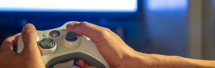 Photo from the point of view of a person holding an Xbox controller