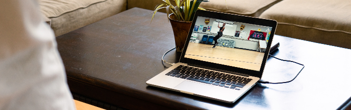 picture of laptop displaying an SRWC fitness class